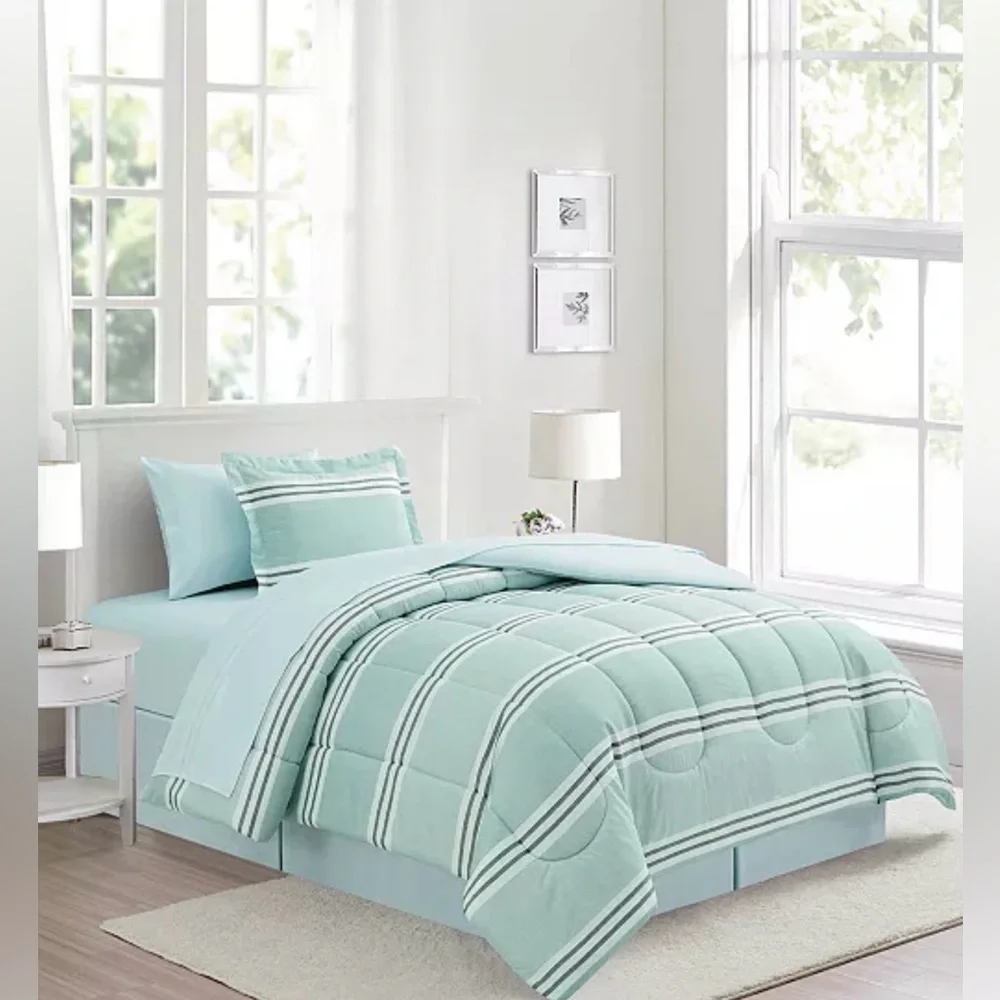 Reversible Color block w a seaside vibe, the Aiden comforter Set.